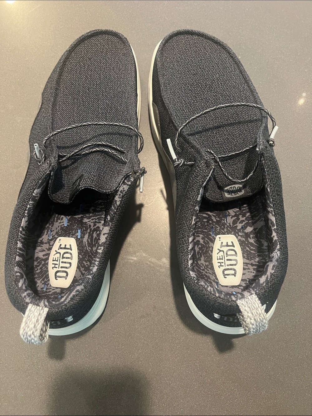 Hey Dude Black Slip-On Canvas Sneakers with White Soles
